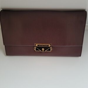 NWOT! Michael Kors leather clutch/cross body bag 9.5"Wx6"Hx1.6"D, gold hardware.